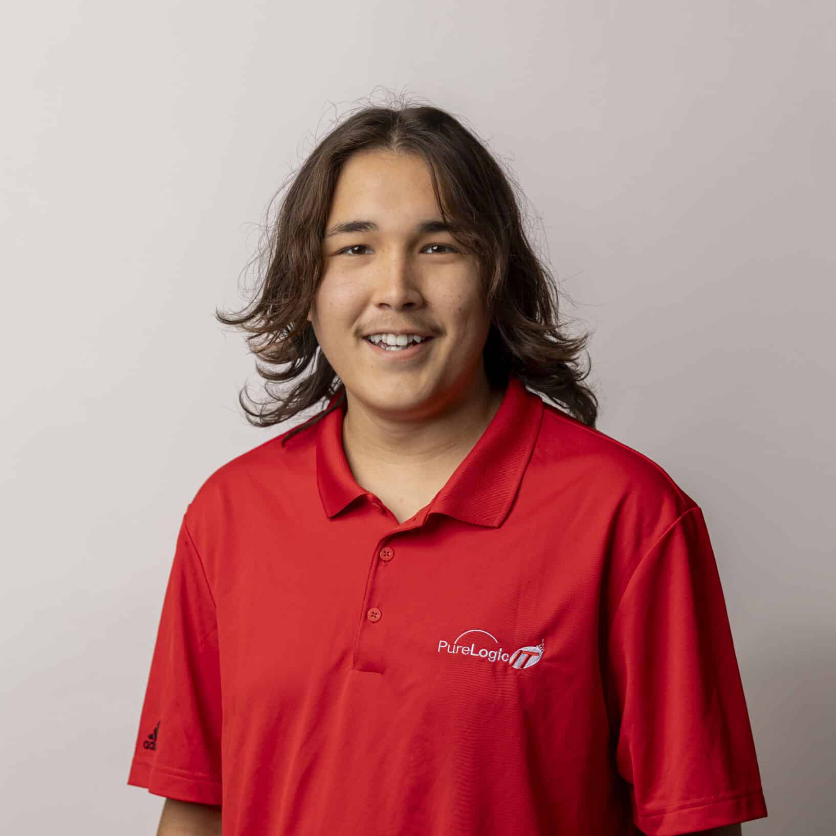 Headshot of Quin Winsitainer