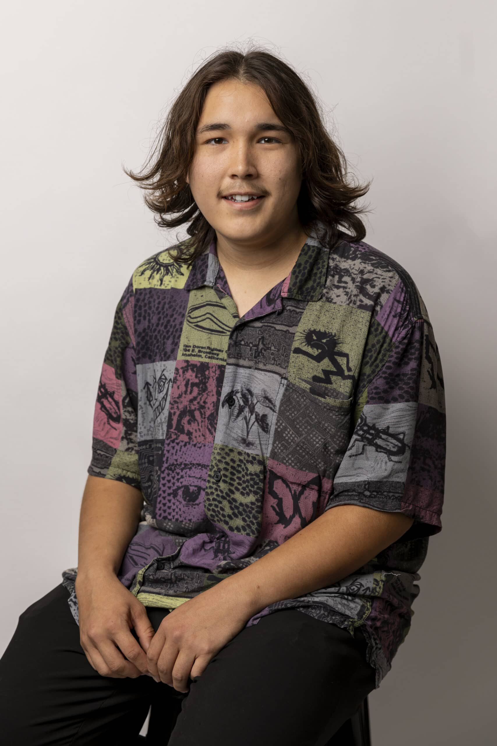 Headshot of Quin Winsitainer